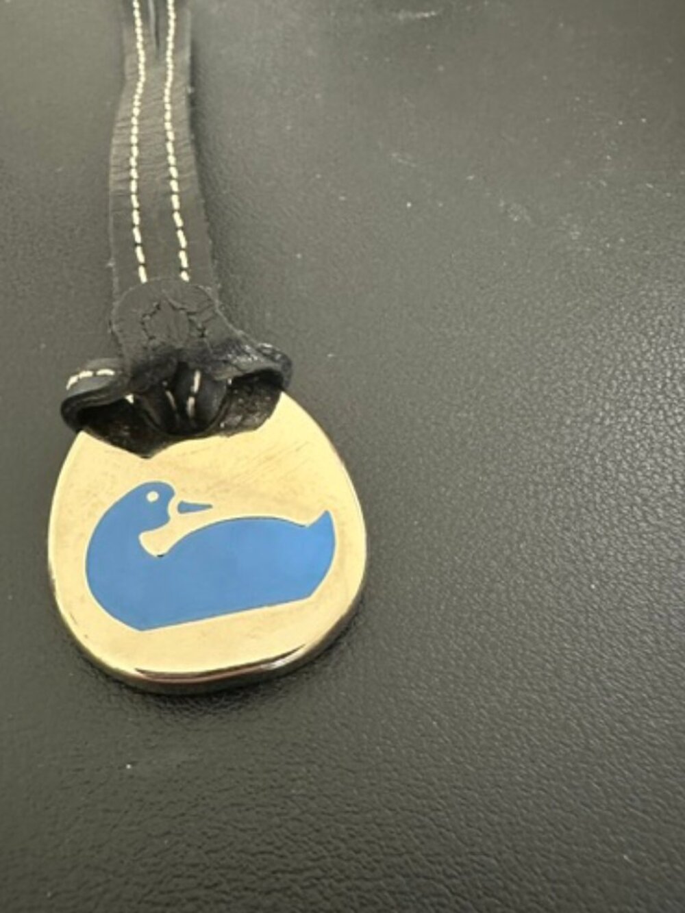 Dooney bag tag
